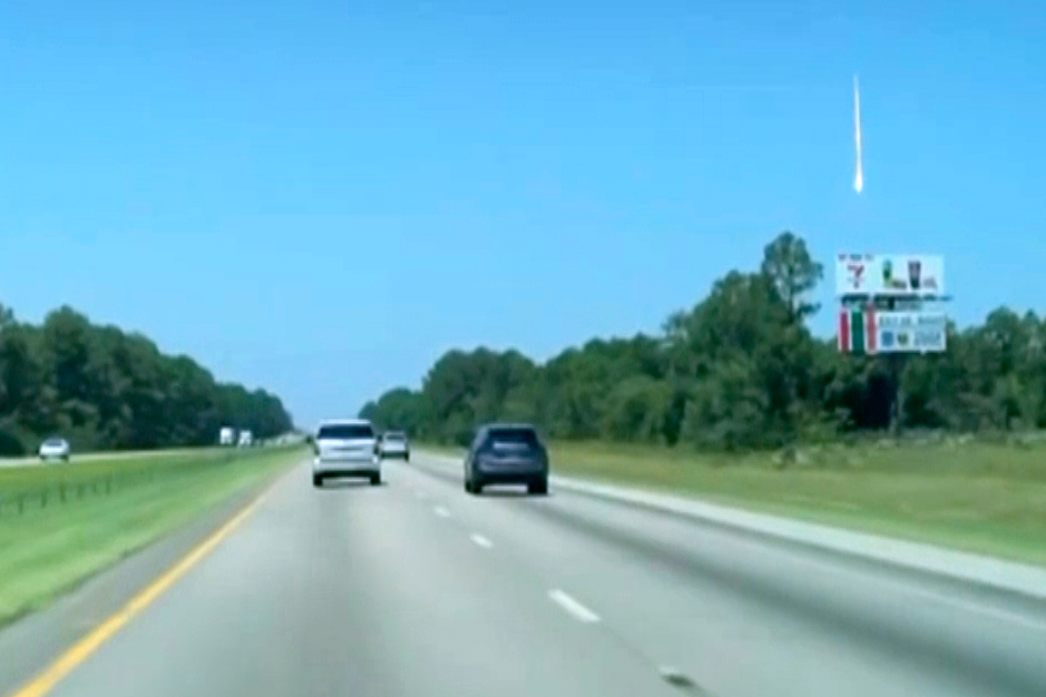 In this photo taken from video shows a bright object traveling in the sky in McDonough, Ga., Thursd...