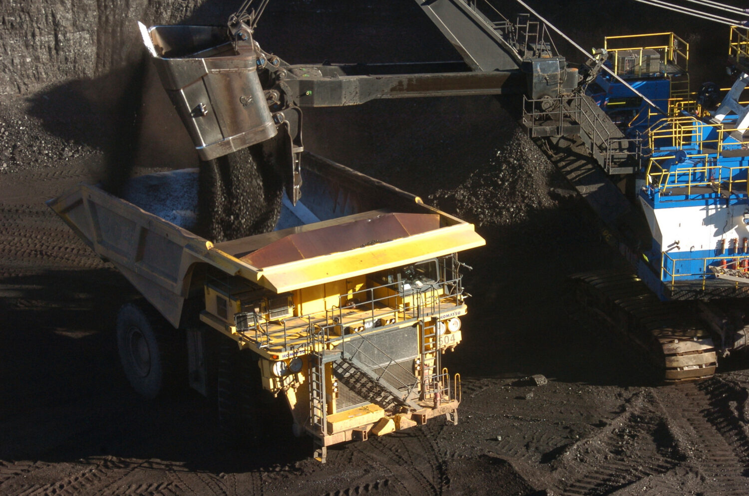 FILE - A mechanized shovel loads coal into a haul truck at a mine near Decker, Mont., on Nov. 15, 2...