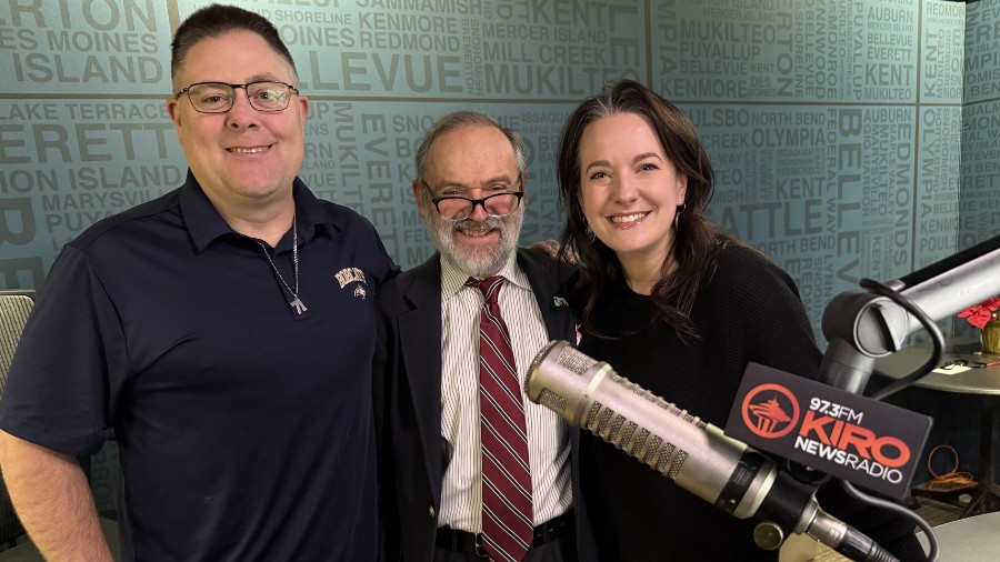 Image: From left, Chris Sullivan, Dave Ross and Colleen O'Brien stand together in the KIRO Newsradi...