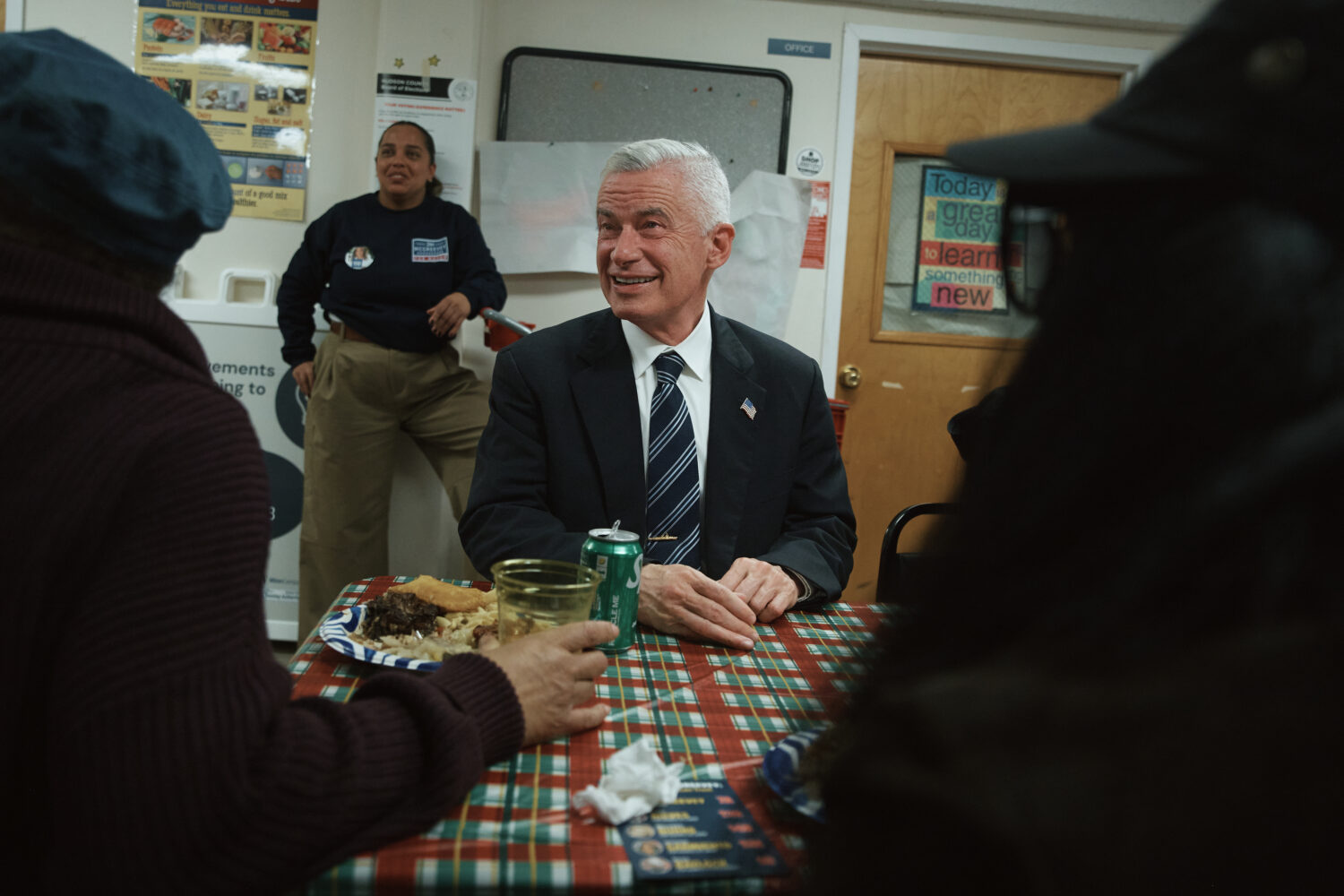 Jersey City mayoral candidate Jim McGreevey, center, listens during a community event on Wednesday,...