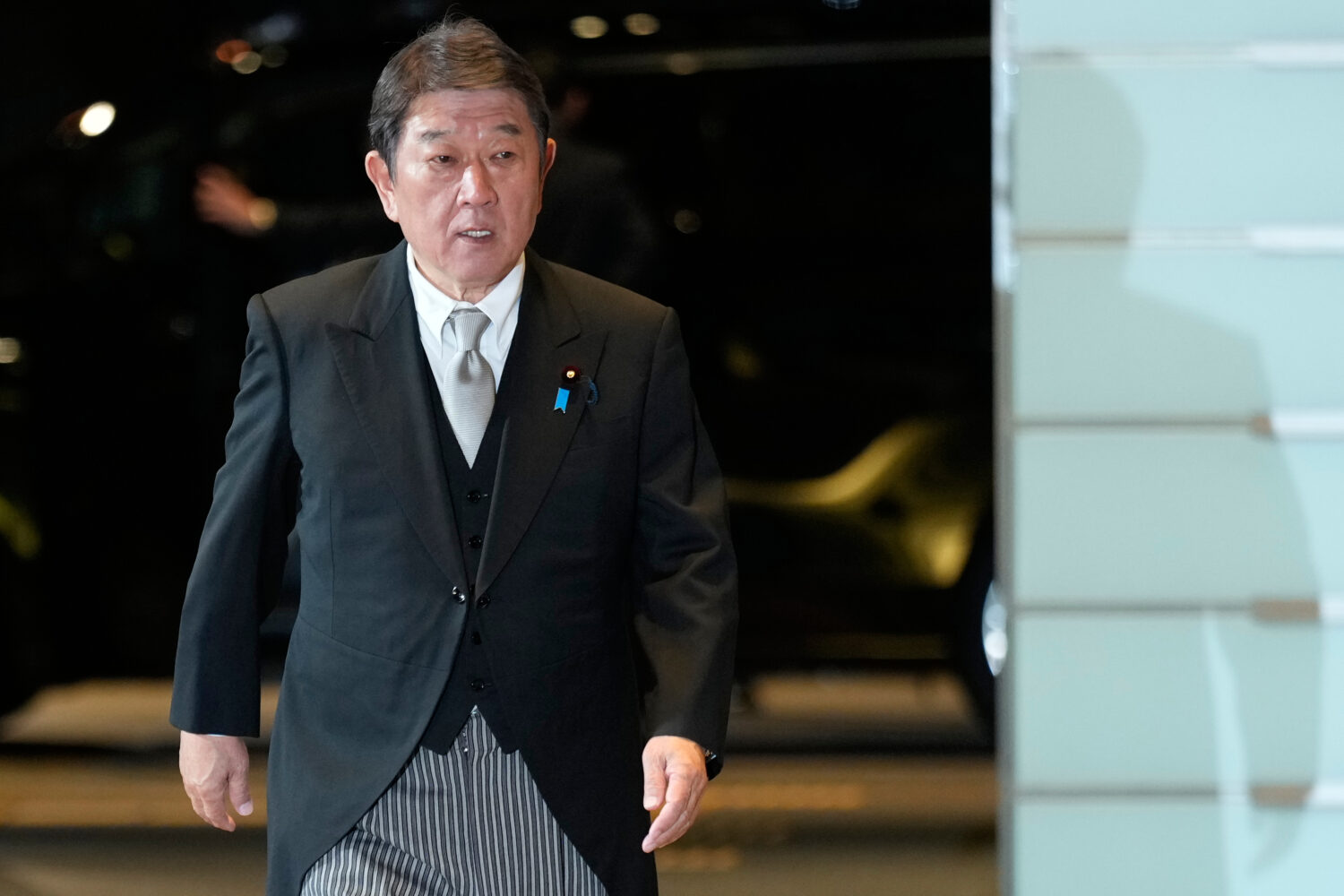 Toshimitsu Motegi, newly appointed foreign minister, arrives at the prime minister's office in Toky...