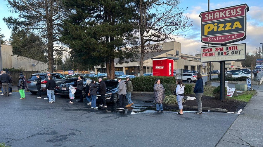 Image: Customers lined up outside the Skakey's in Renton on Friday, Jan. 17, 2025. They were lookin...
