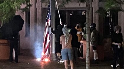 Protesters burn American flags outside Seattle federal building; more protests to happen Wed night