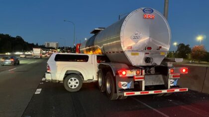Two right lanes of SB I-5 are blocked after pickup truck wedged under fuel hauler